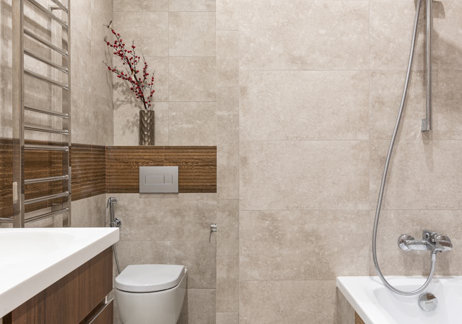 Stylish bathroom featuring contemporary fixtures and elegant tile design.